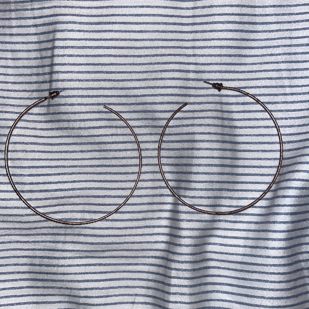 Brass-colored hoop earrings